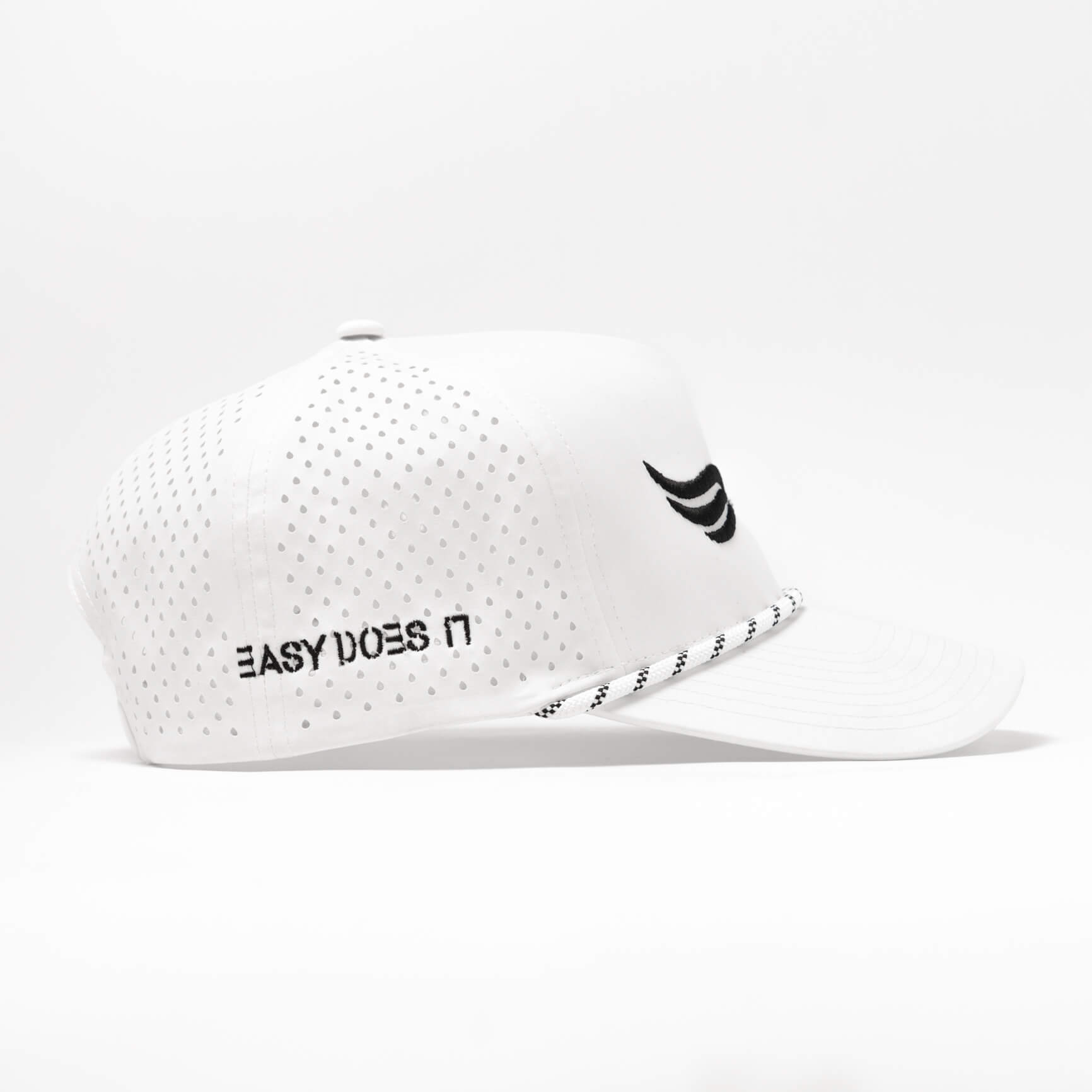  Structured white performance hat with rope accent for golf or everyday use.